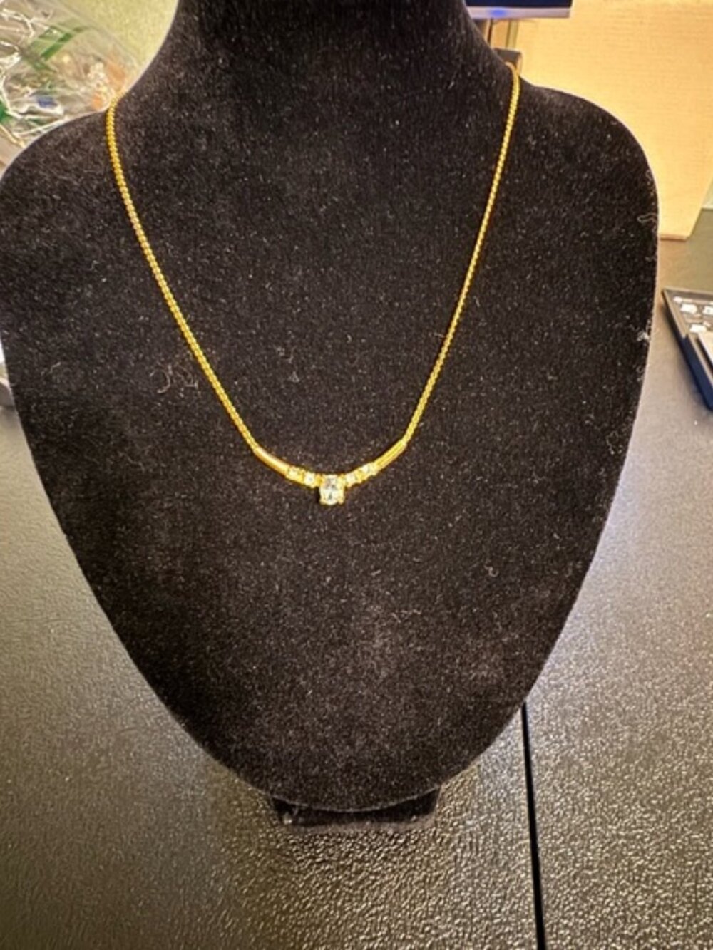 Elegant Gold Tone Necklace with Aquamarine and Clear Colored Crystal Accents